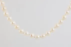 22" 14k Yellow Gold Pearl Necklace (32.41g.)