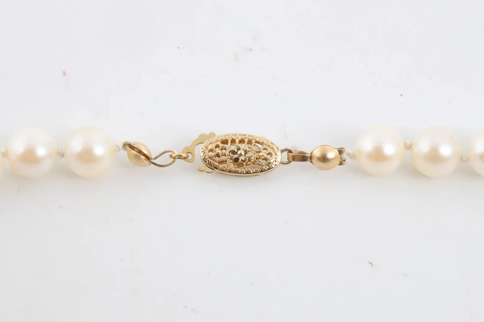 22" 14k Yellow Gold Pearl Necklace (32.41g.)