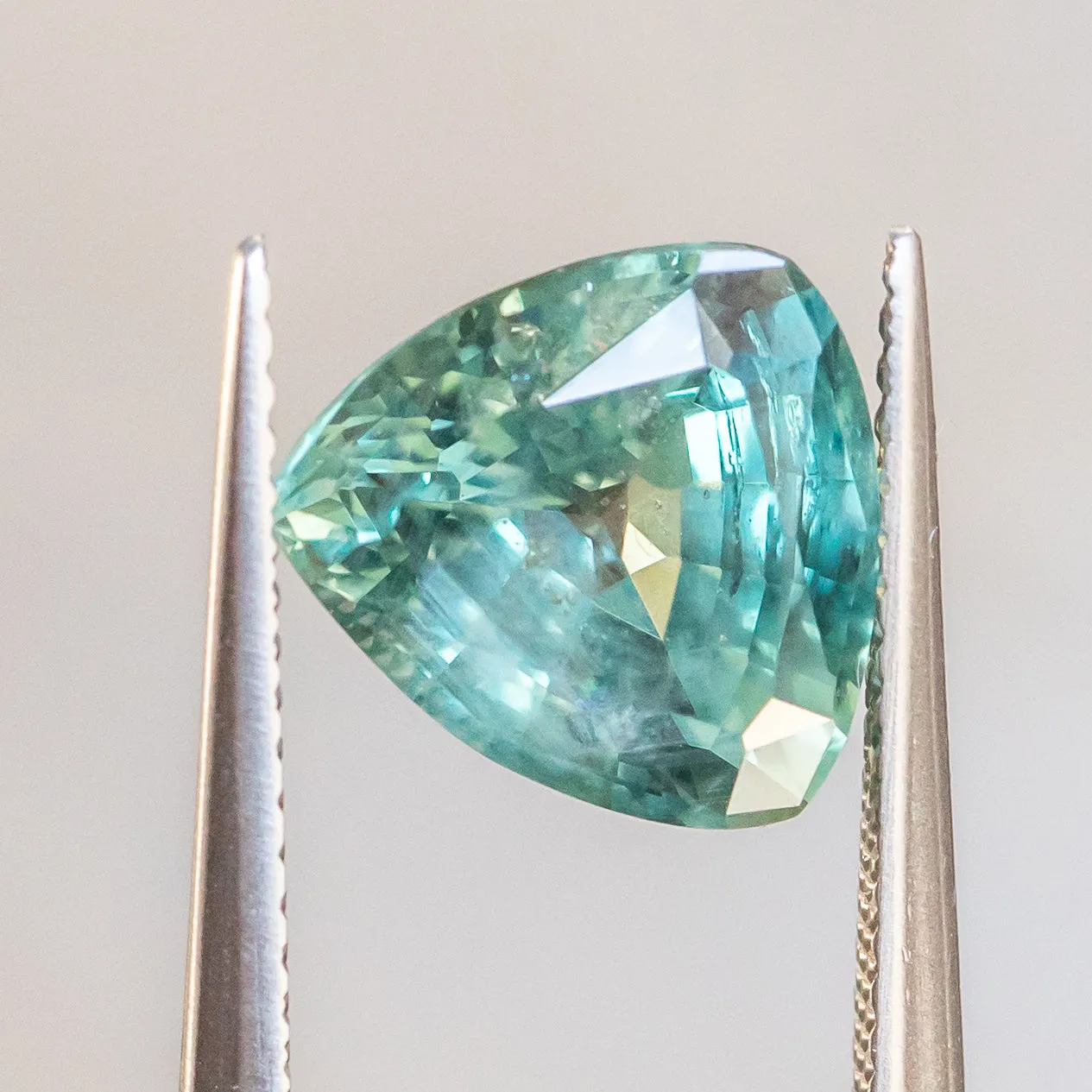 4.66CT TRILLION MONTANA SAPPHIRE, SILKY TEAL GREEN, 10.38X9.70X5.85MM, UNHEATED