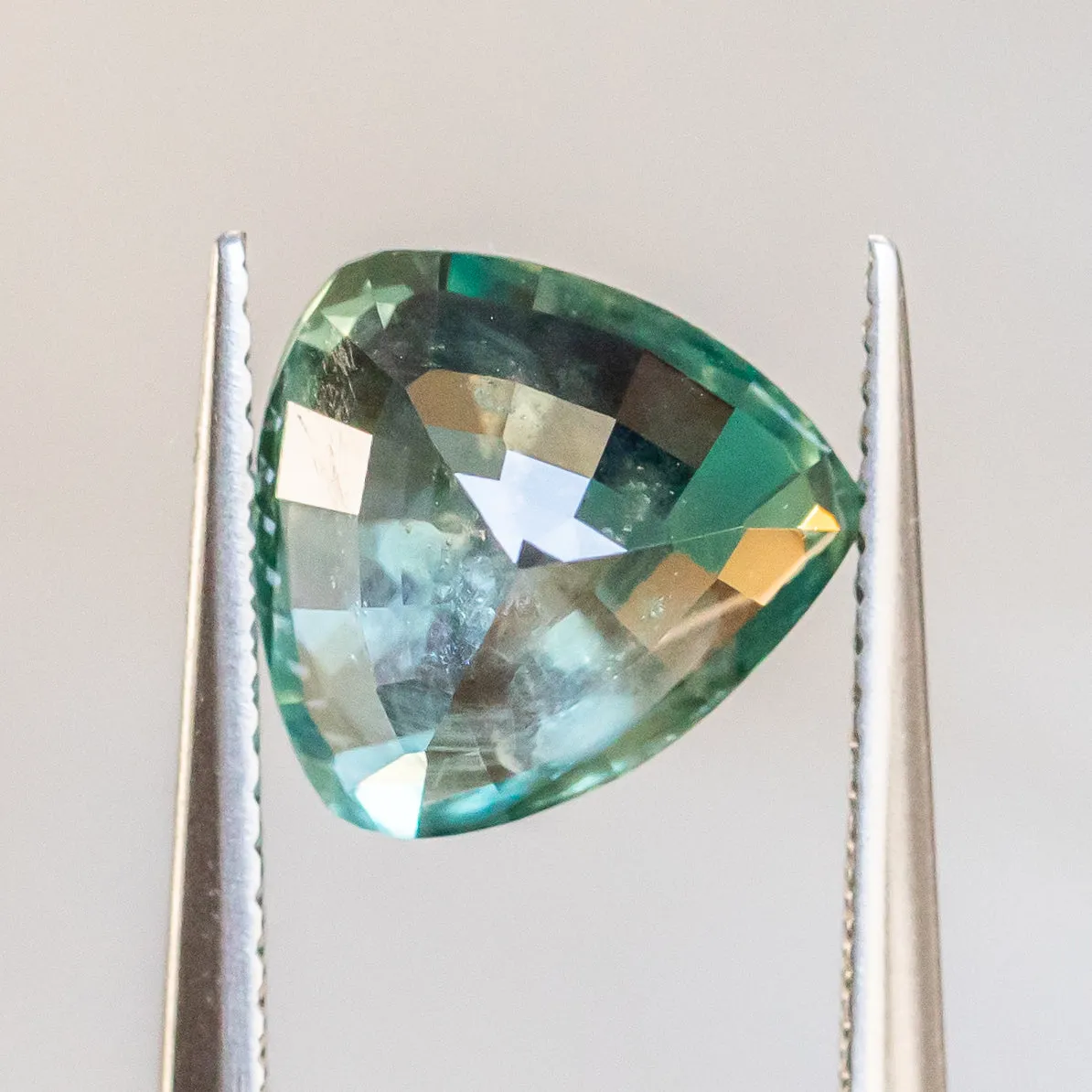 4.66CT TRILLION MONTANA SAPPHIRE, SILKY TEAL GREEN, 10.38X9.70X5.85MM, UNHEATED