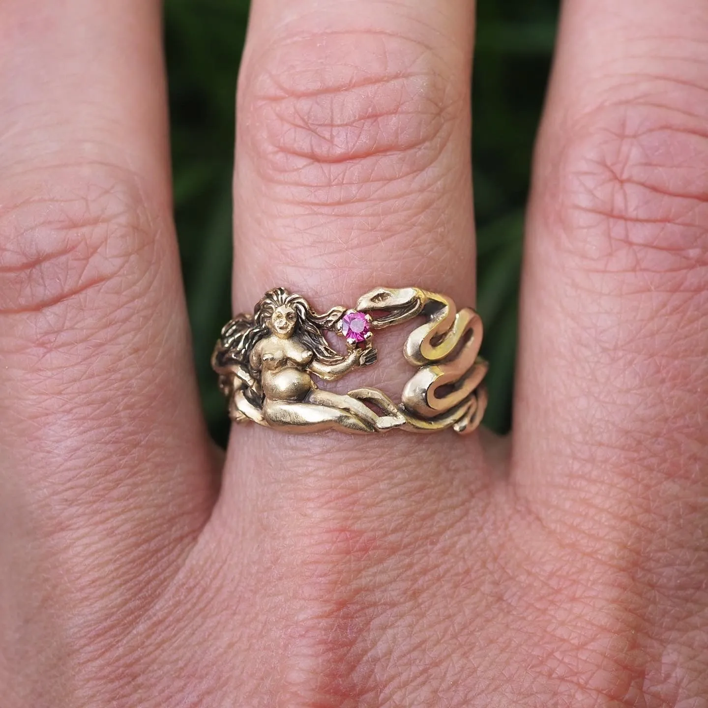 Nudie and the serpent ring