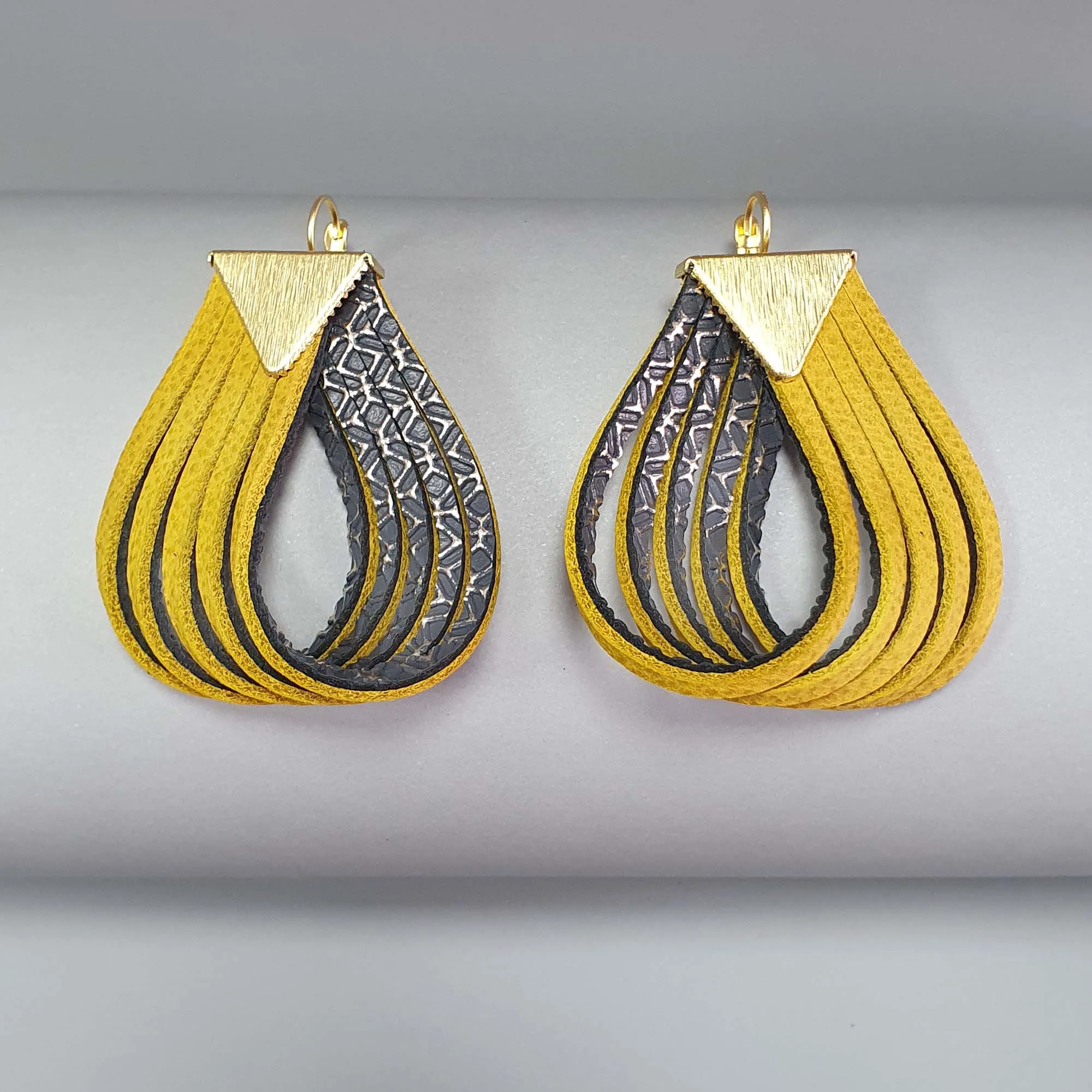 Twist bold yellow leather earrings